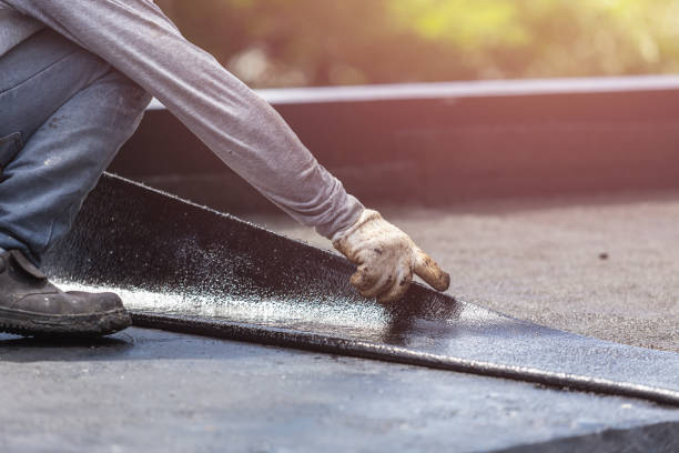 Professional Basement Waterproofing technician working in Rosholt, WI